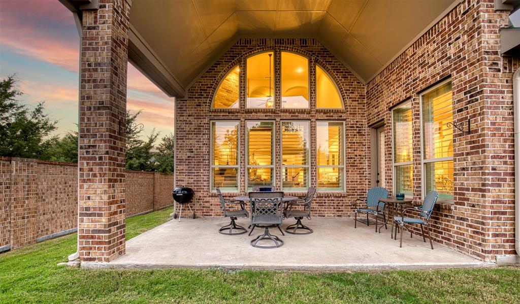 7760 Hackamore Street Frisco, TX 75036 - Photo 33 of 40 Nice sized covered patio with soaring ceiling.