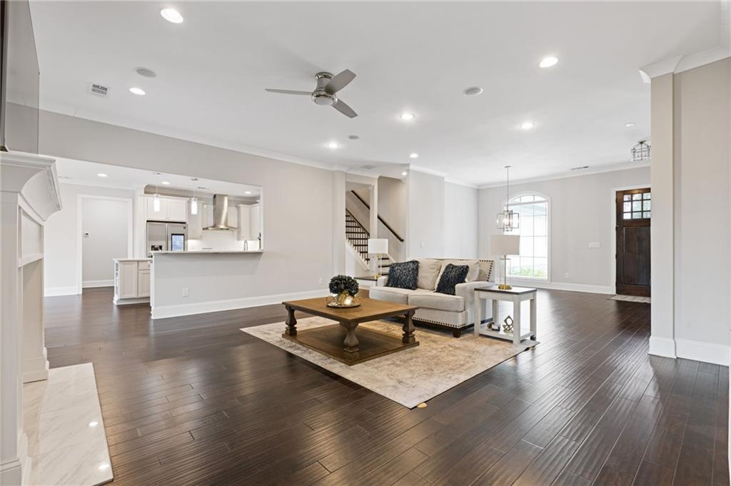 1560 Tapestry Ridge Southeast Lawrenceville, GA 30045 - Photo 14 of 57 a living room with furniture and wooden floor