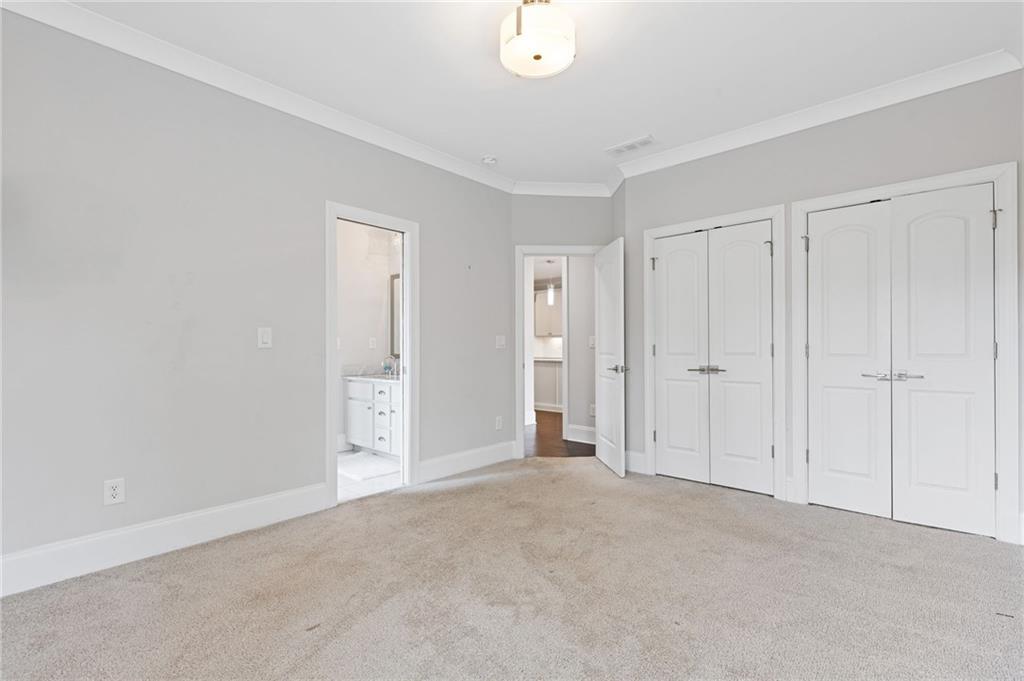 1560 Tapestry Ridge Southeast Lawrenceville, GA 30045 - Photo 22 of 57 a view of an empty room