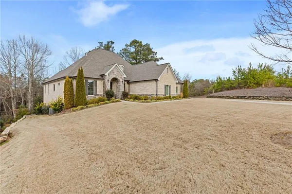 front view of a house with a yard