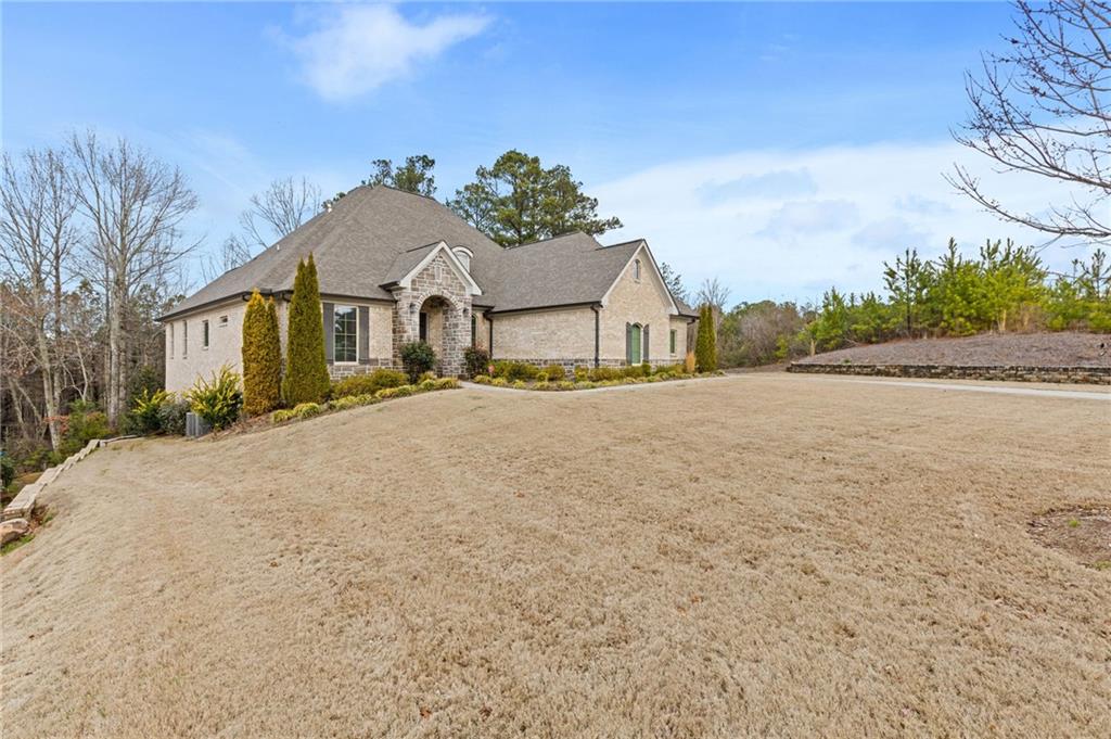 1560 Tapestry Ridge Southeast Lawrenceville, GA 30045 - Photo 3 of 57 front view of a house with a yard