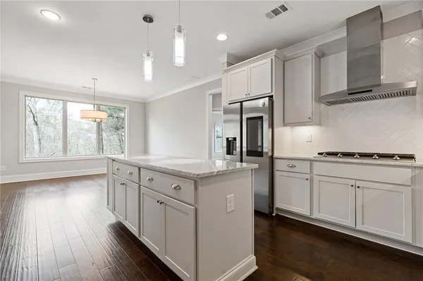 a view of entryway with wooden floor