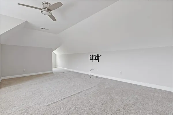 a bathroom with a shower and a shower