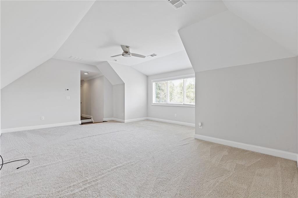 1560 Tapestry Ridge Southeast Lawrenceville, GA 30045 - Photo 36 of 57 an empty room with windows and closet