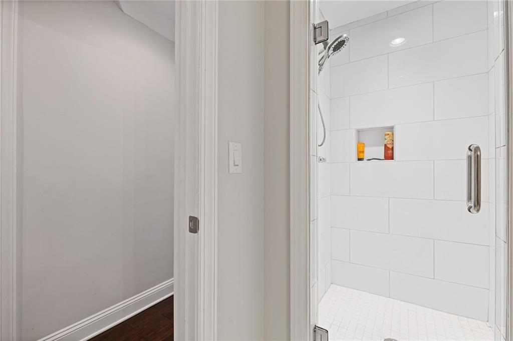 1560 Tapestry Ridge Southeast Lawrenceville, GA 30045 - Photo 40 of 57 a bathroom with a shower and a shower