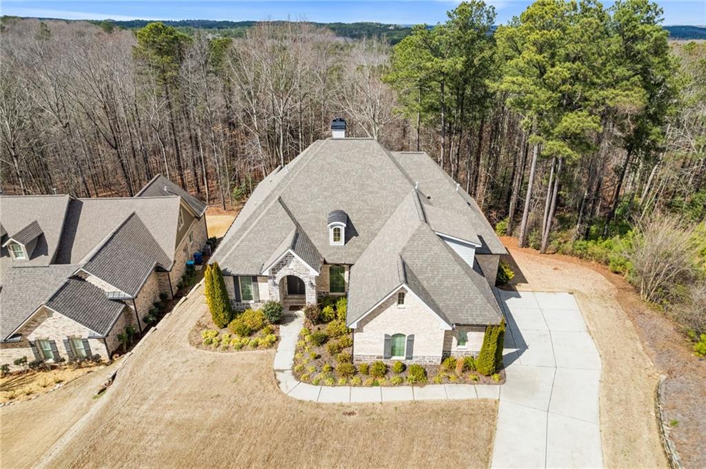 1560 Tapestry Ridge Southeast Lawrenceville, GA 30045 - Photo 55 of 57 a view of swimming pool with a house in background