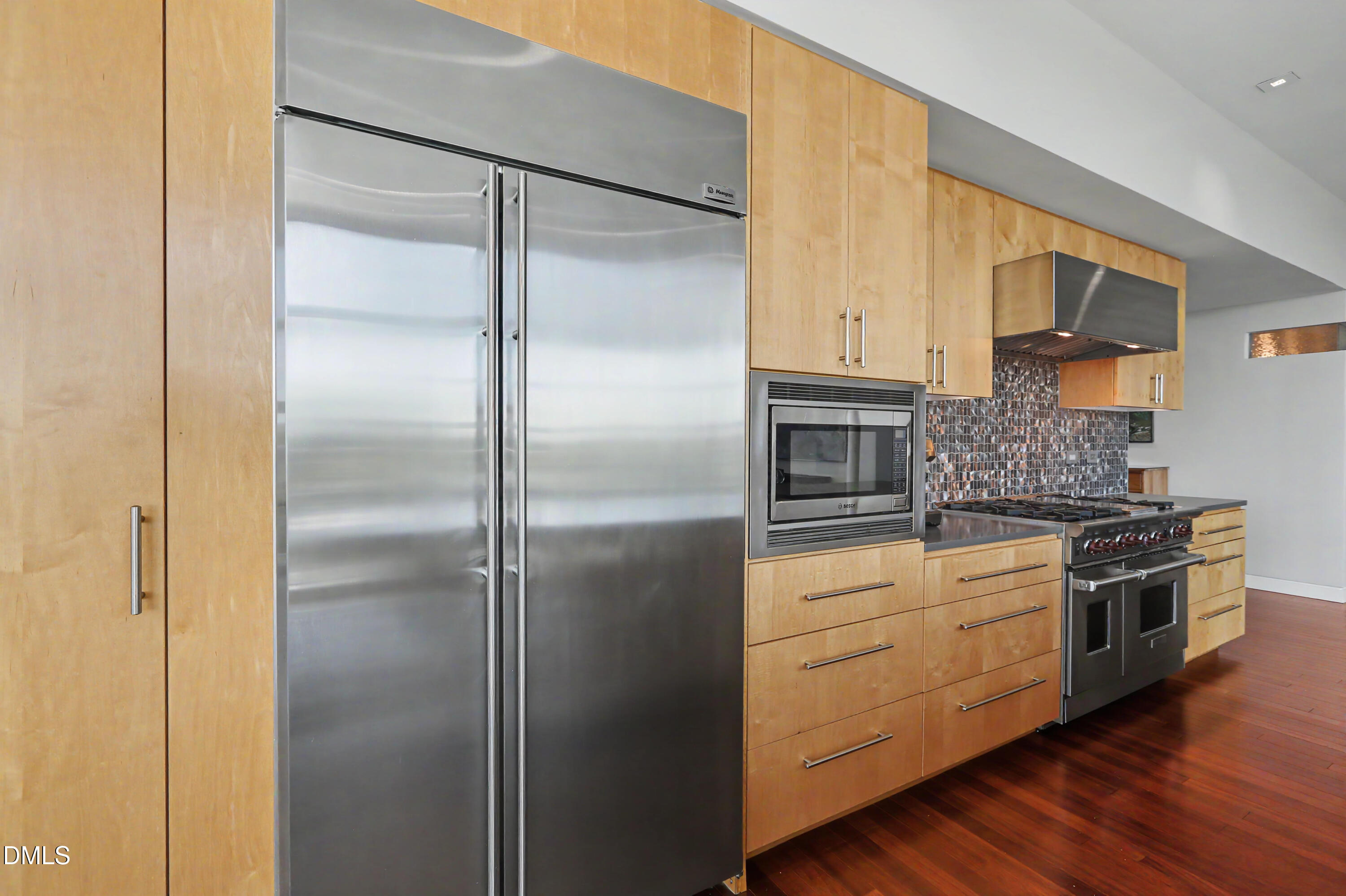 331 West Barbee Chapel Road Chapel Hill, NC 27517 - Photo 28 of 92 a kitchen with a refrigerator and a stove