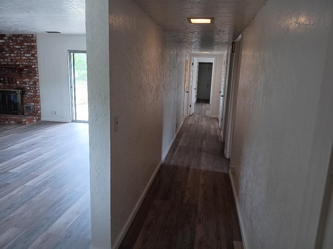 19324 Farallon Road Madera, CA 93638 - Photo 6 of 10 wooden floor in a gallery