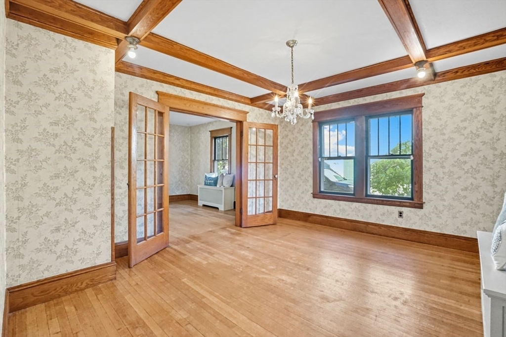15 Bronson Terrace Springfield, MA 01108 - Photo 12 of 42 a view of a livingroom with a chandelier a dinning table and chandelier