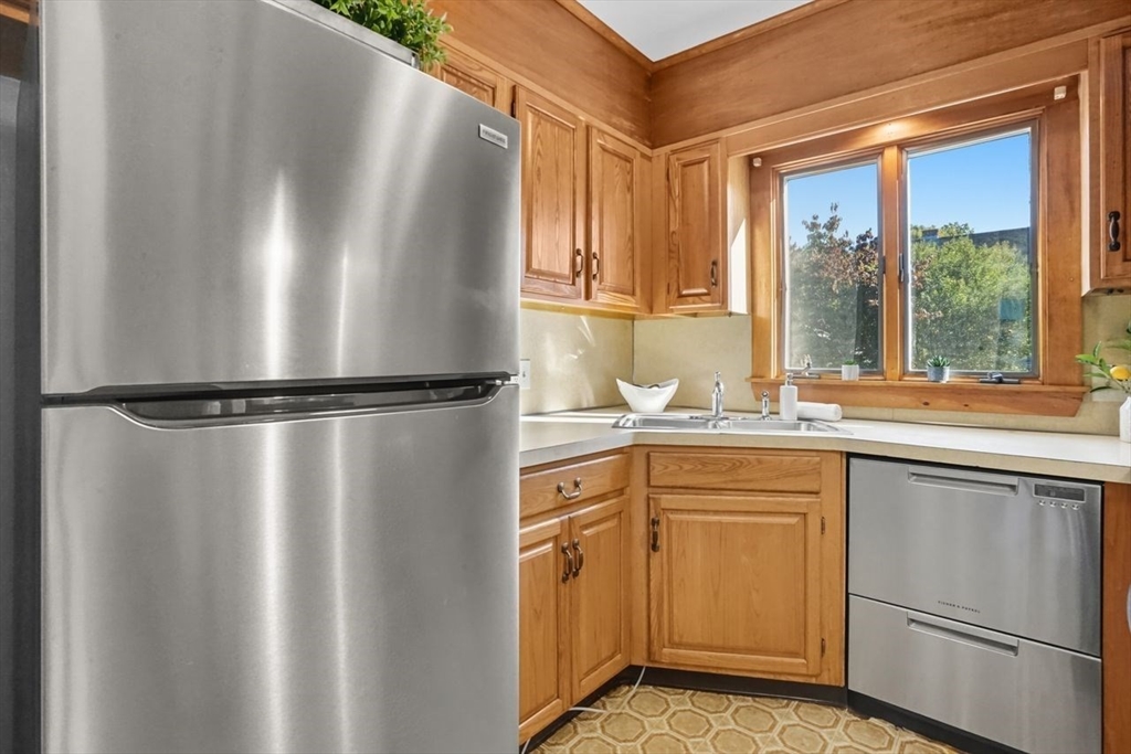 15 Bronson Terrace Springfield, MA 01108 - Photo 19 of 42 a kitchen with a refrigerator and a sink