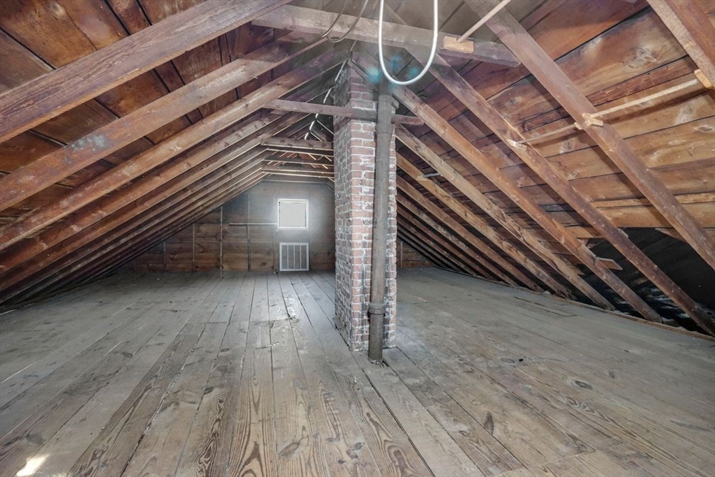 15 Bronson Terrace Springfield, MA 01108 - Photo 35 of 42 a view of a room with wooden floor and stairs