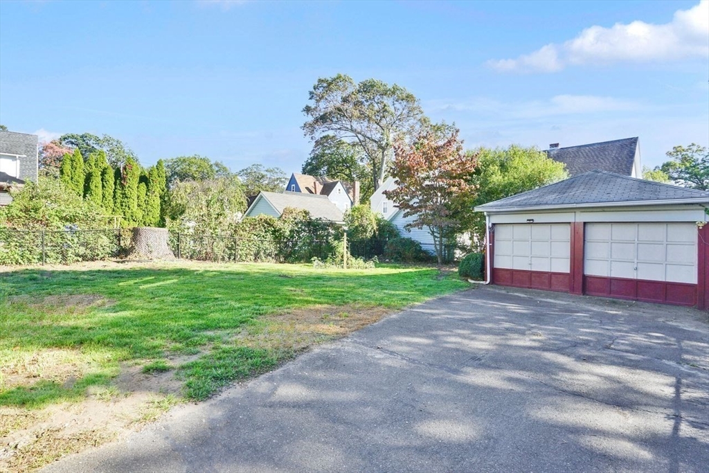 15 Bronson Terrace Springfield, MA 01108 - Photo 37 of 42 a view of a house with backyard and garden