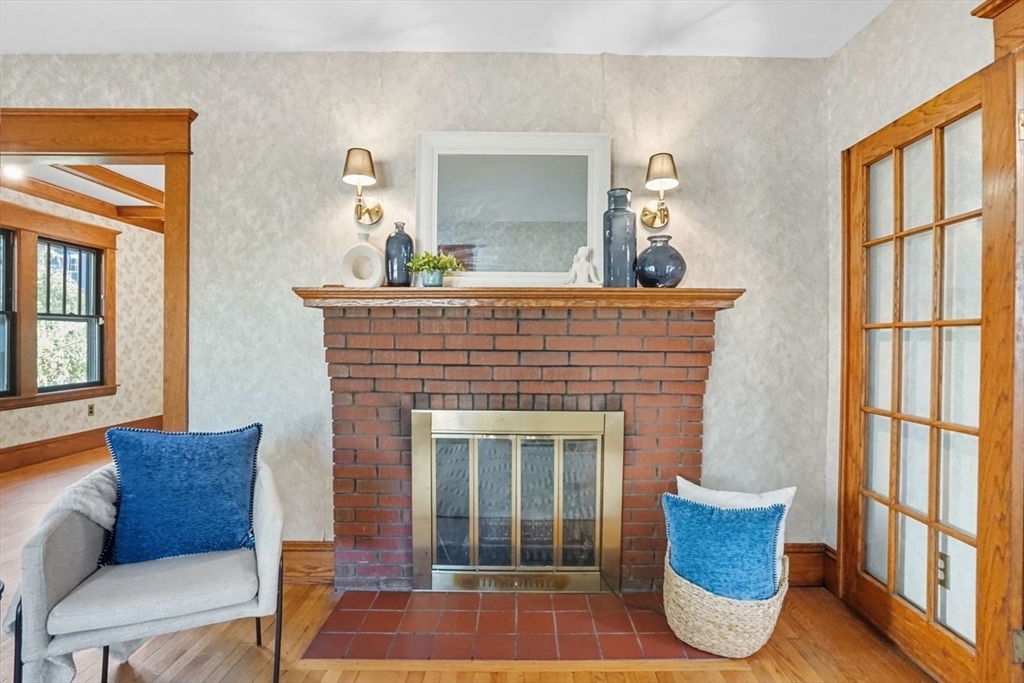 15 Bronson Terrace Springfield, MA 01108 - Photo 5 of 42 a living room with furniture and a fireplace