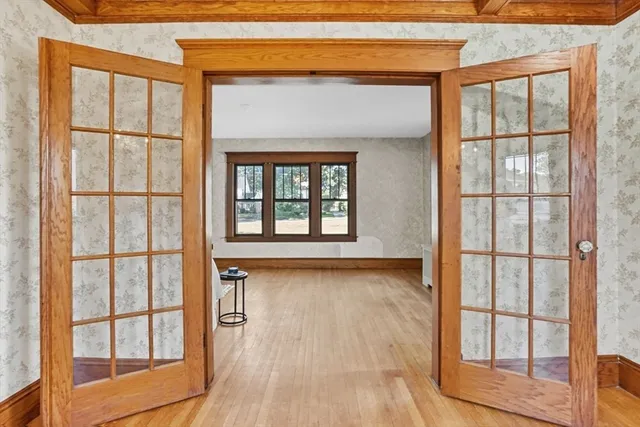 a view of a livingroom with wooden floor