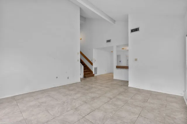 an empty room with a natural light