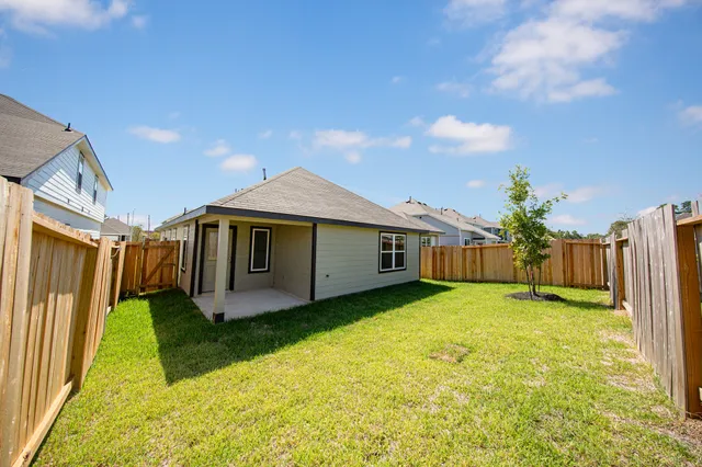 a house with a yard in front of it