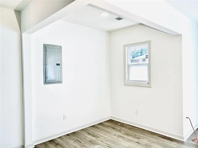 a view of a room that has a window in it