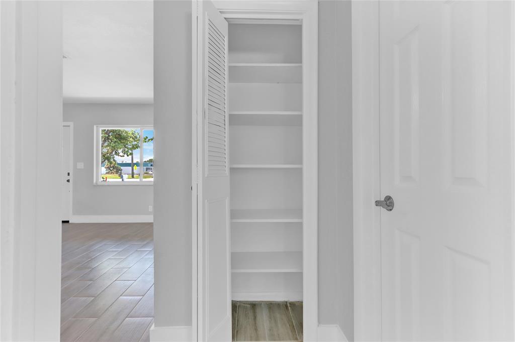 2822 North Dixie Highway Boca Raton, FL 33431 - Photo 18 of 22 a view of an entryway with wooden floor