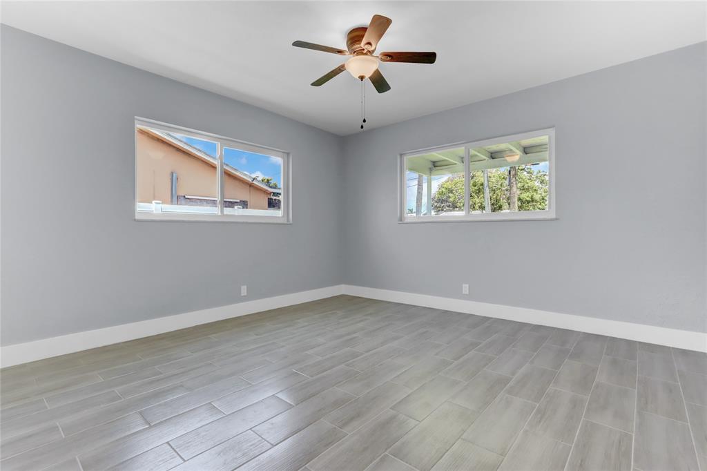 2822 North Dixie Highway Boca Raton, FL 33431 - Photo 9 of 22 a view of room with window and ceiling fan