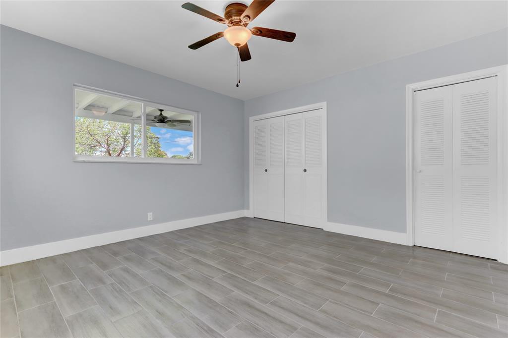 2822 North Dixie Highway Boca Raton, FL 33431 - Photo 10 of 22 a view of an empty room with wooden floor