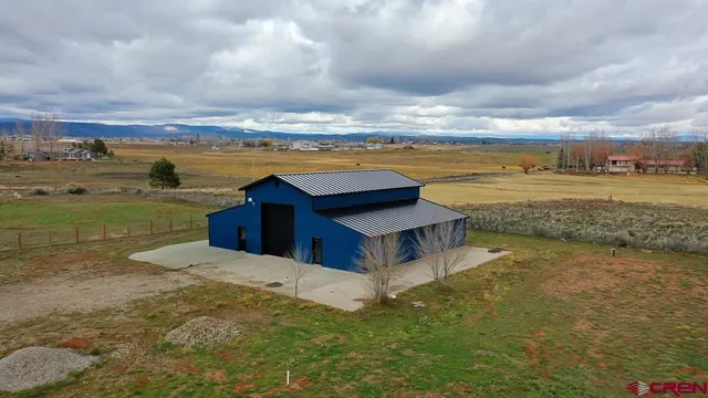 a view of a lake with a big yard