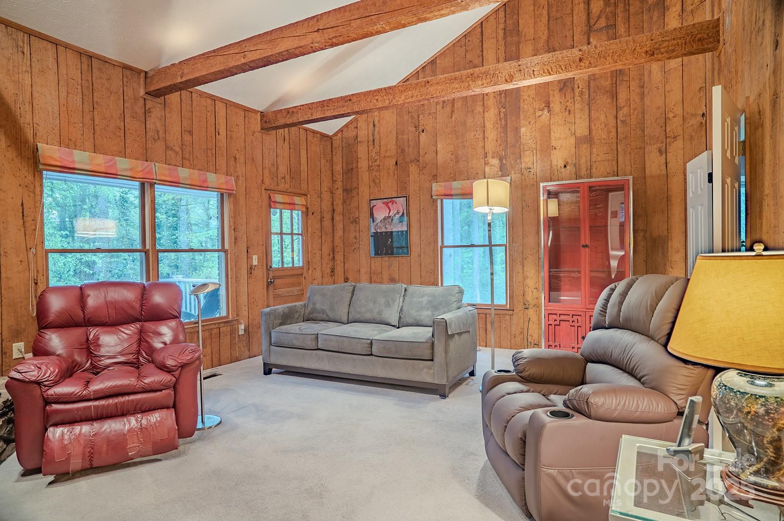 290 Tranquility Place Hendersonville, NC 28739 - Photo 24 of 48 a living room with furniture and a window