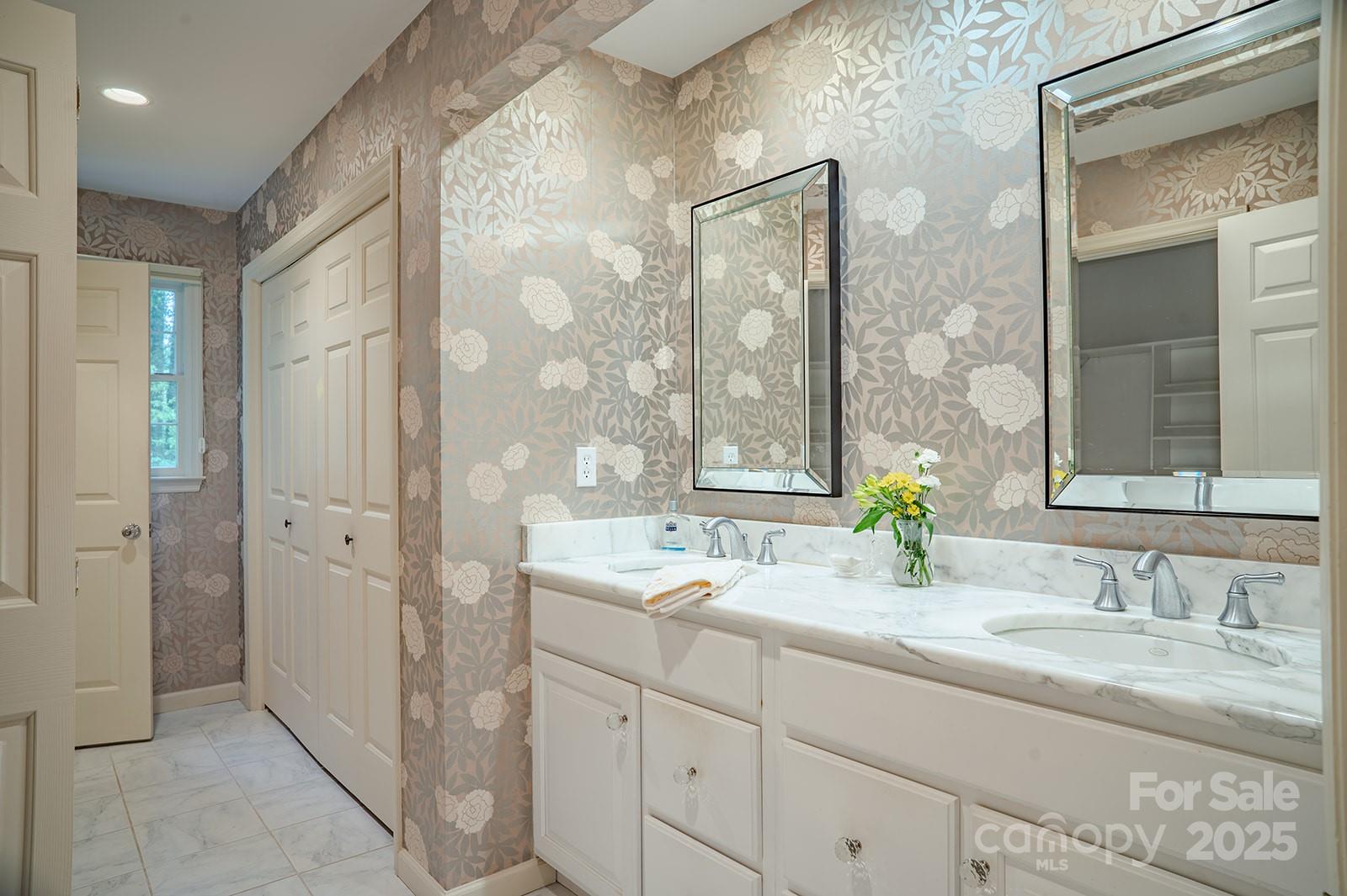 290 Tranquility Place Hendersonville, NC 28739 - Photo 30 of 48 a bathroom with a sink double vanity and a mirror