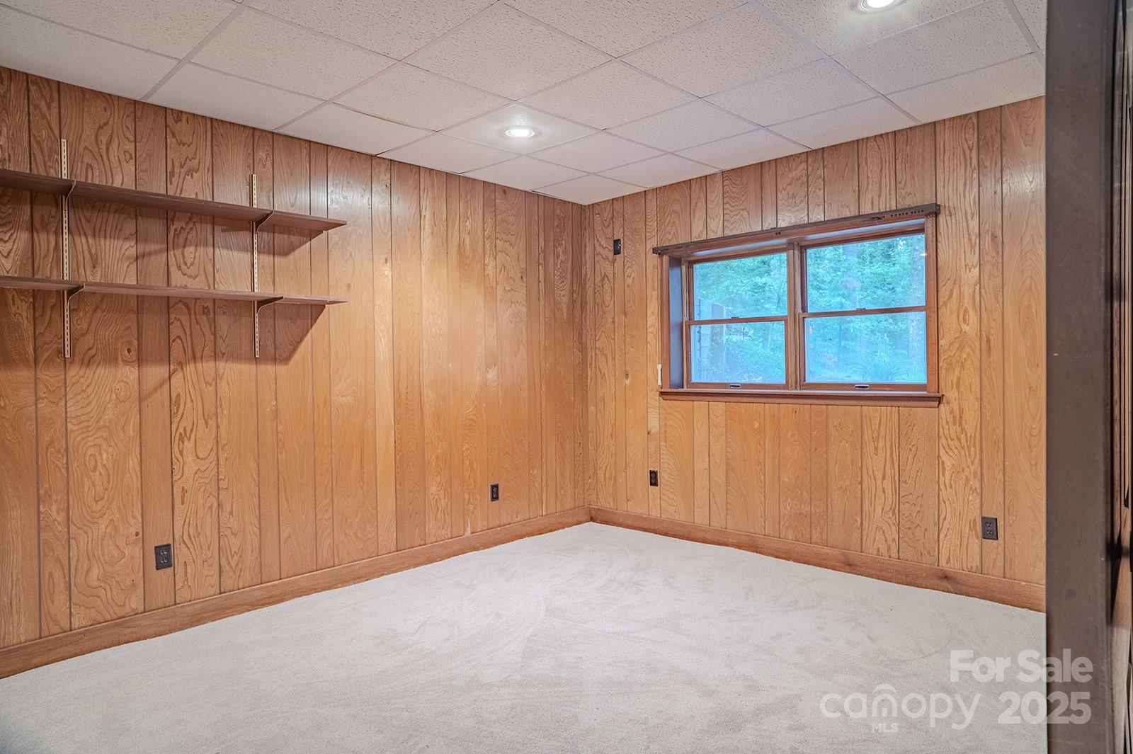 290 Tranquility Place Hendersonville, NC 28739 - Photo 43 of 48 a view of an empty room with a window