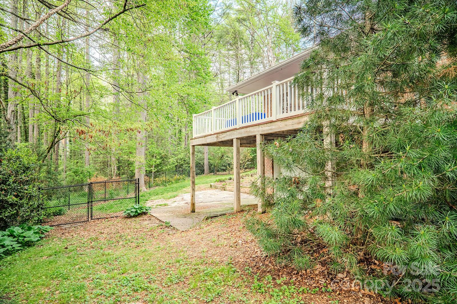 290 Tranquility Place Hendersonville, NC 28739 - Photo 44 of 48 a house view with a backyard space