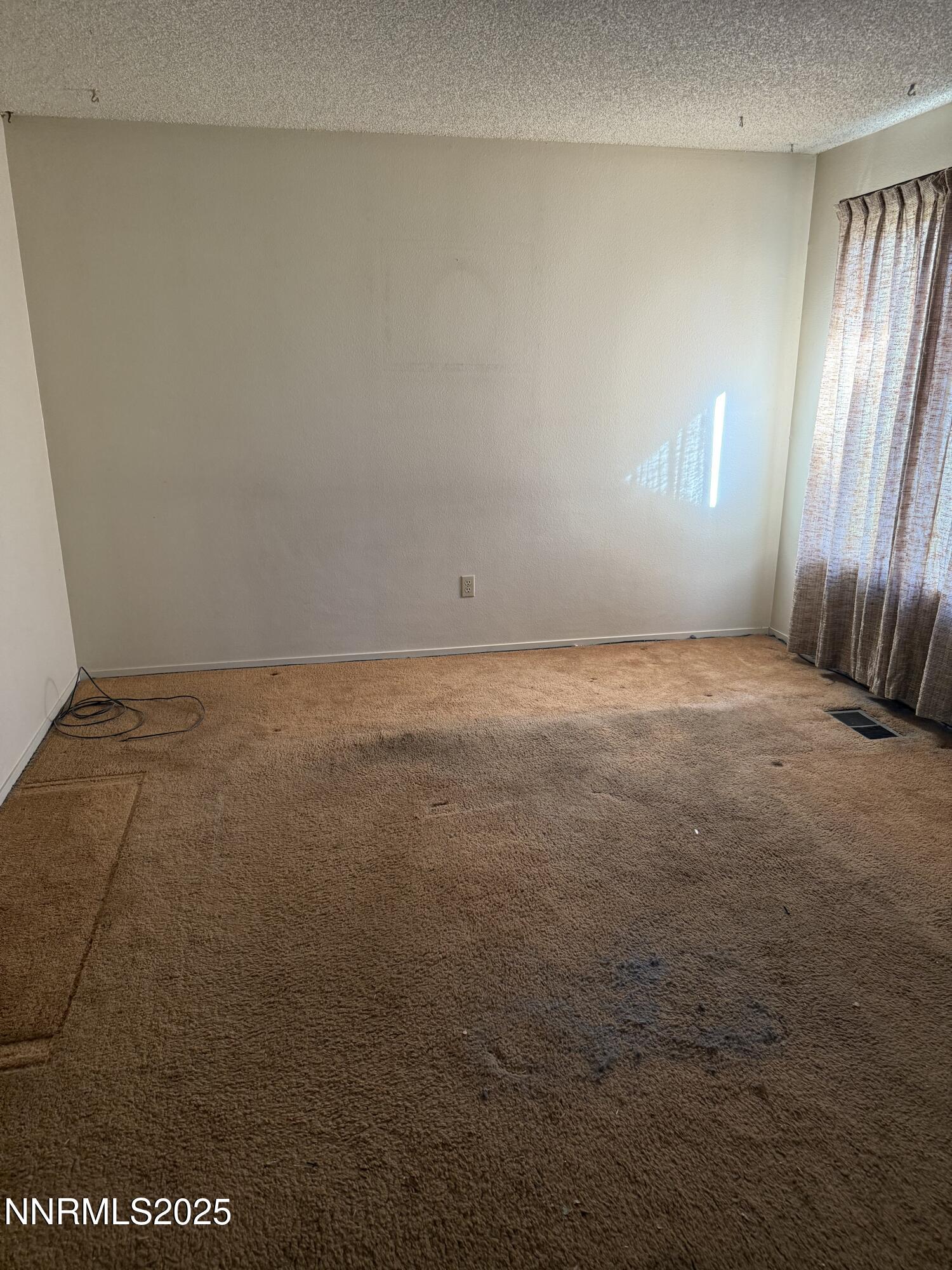 6521 Flower Street Reno, NV 89506 - Photo 2 of 9 a view of an empty room
