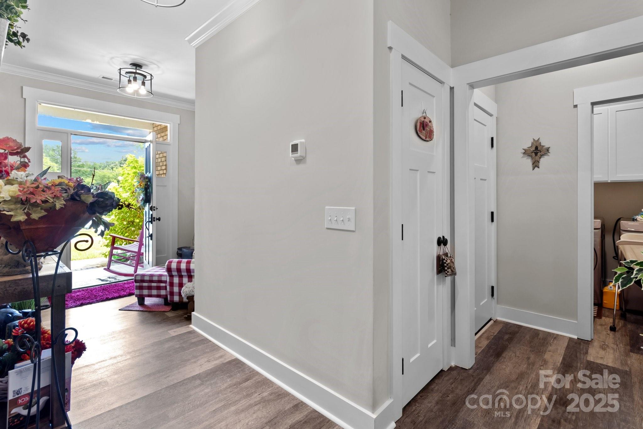 203 Poplins Grove Church Road Albemarle, NC 28001 - Photo 25 of 48 a view of an entryway with wooden floor