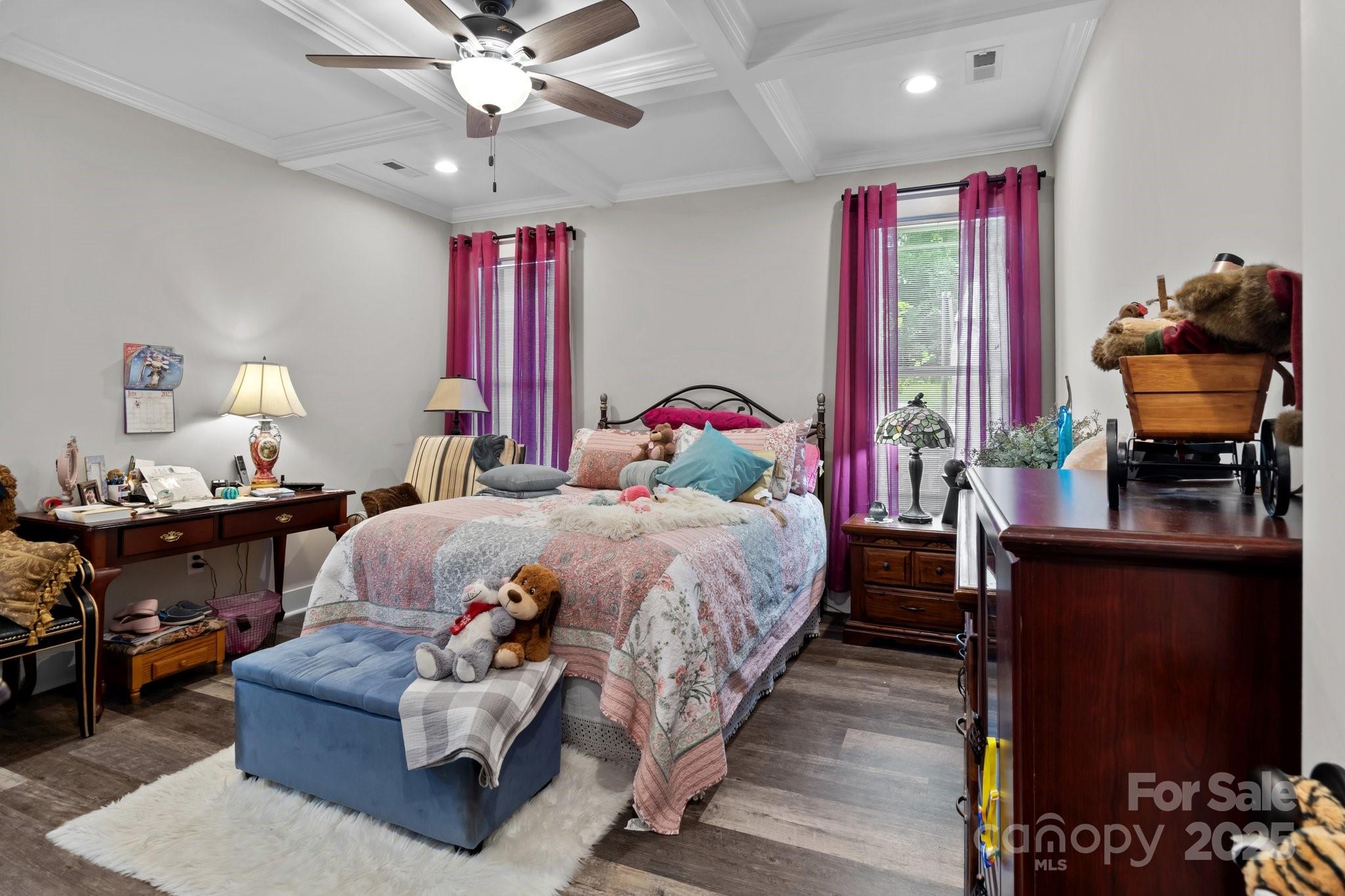 203 Poplins Grove Church Road Albemarle, NC 28001 - Photo 32 of 48 a bedroom with a bed and wooden floor