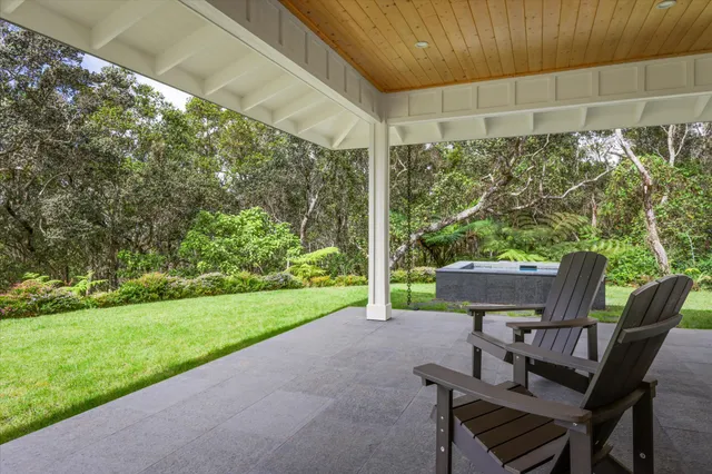 a view of a yard and outdoor seating