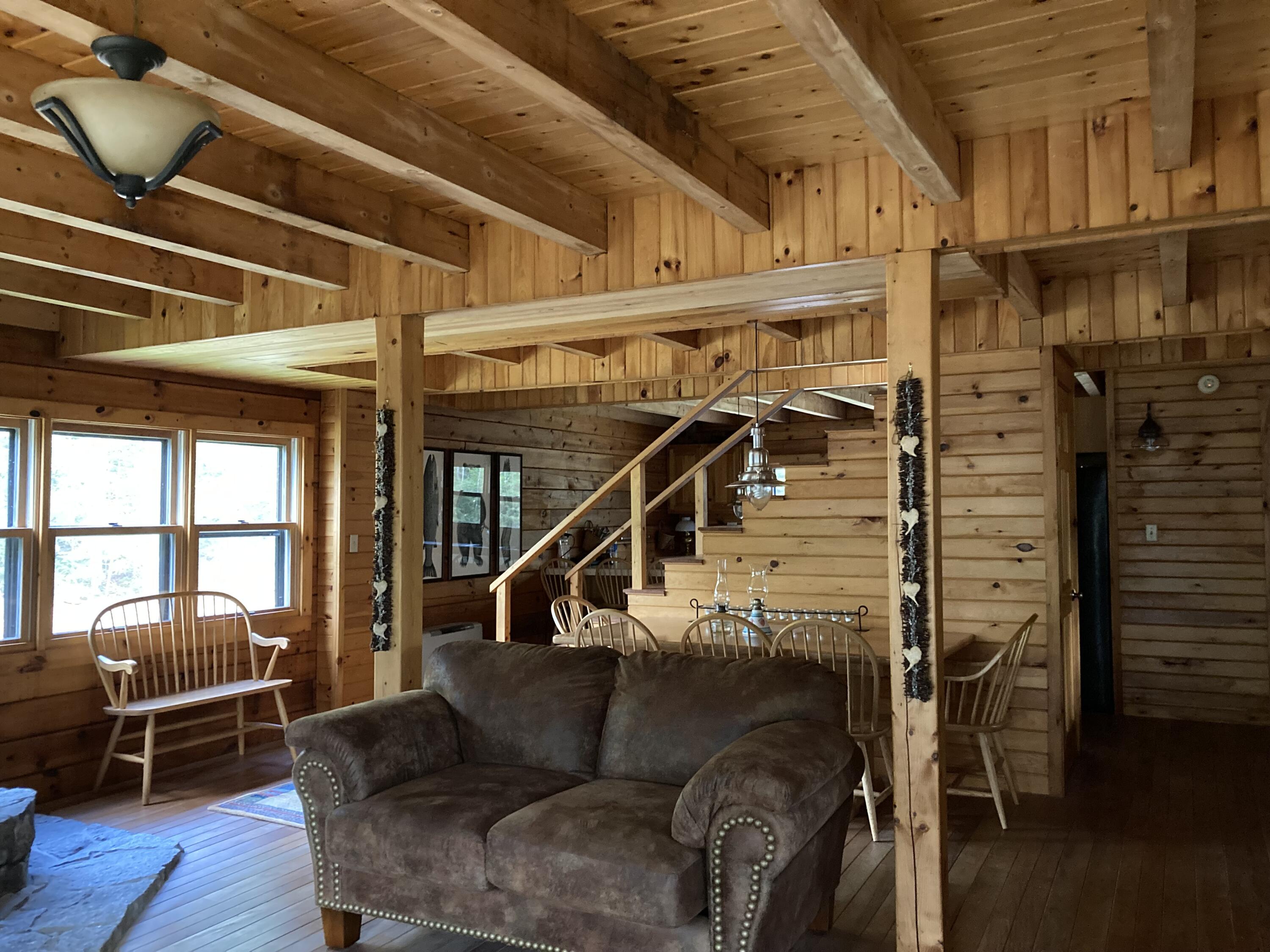 414 River Bend Cherryfield, ME 04622 - Photo 11 of 38 From LR to dining area to kitc.