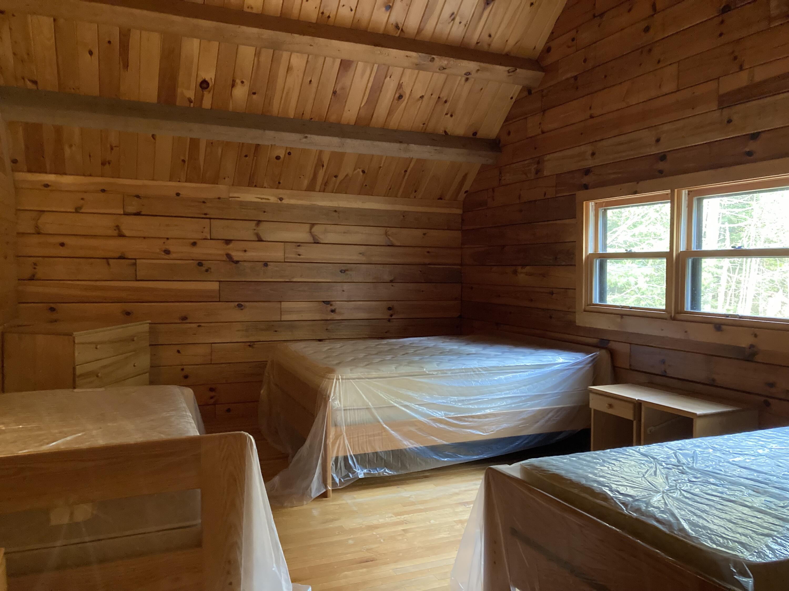 414 River Bend Cherryfield, ME 04622 - Photo 16 of 38 Second-floor bedroom.