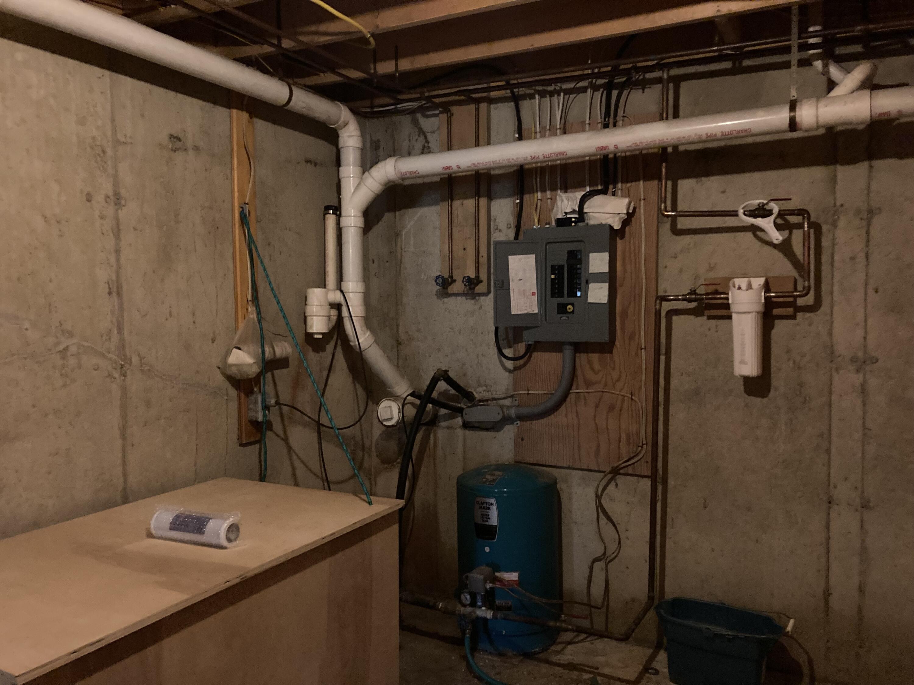 414 River Bend Cherryfield, ME 04622 - Photo 22 of 38 Circuit breaker & battery storage.