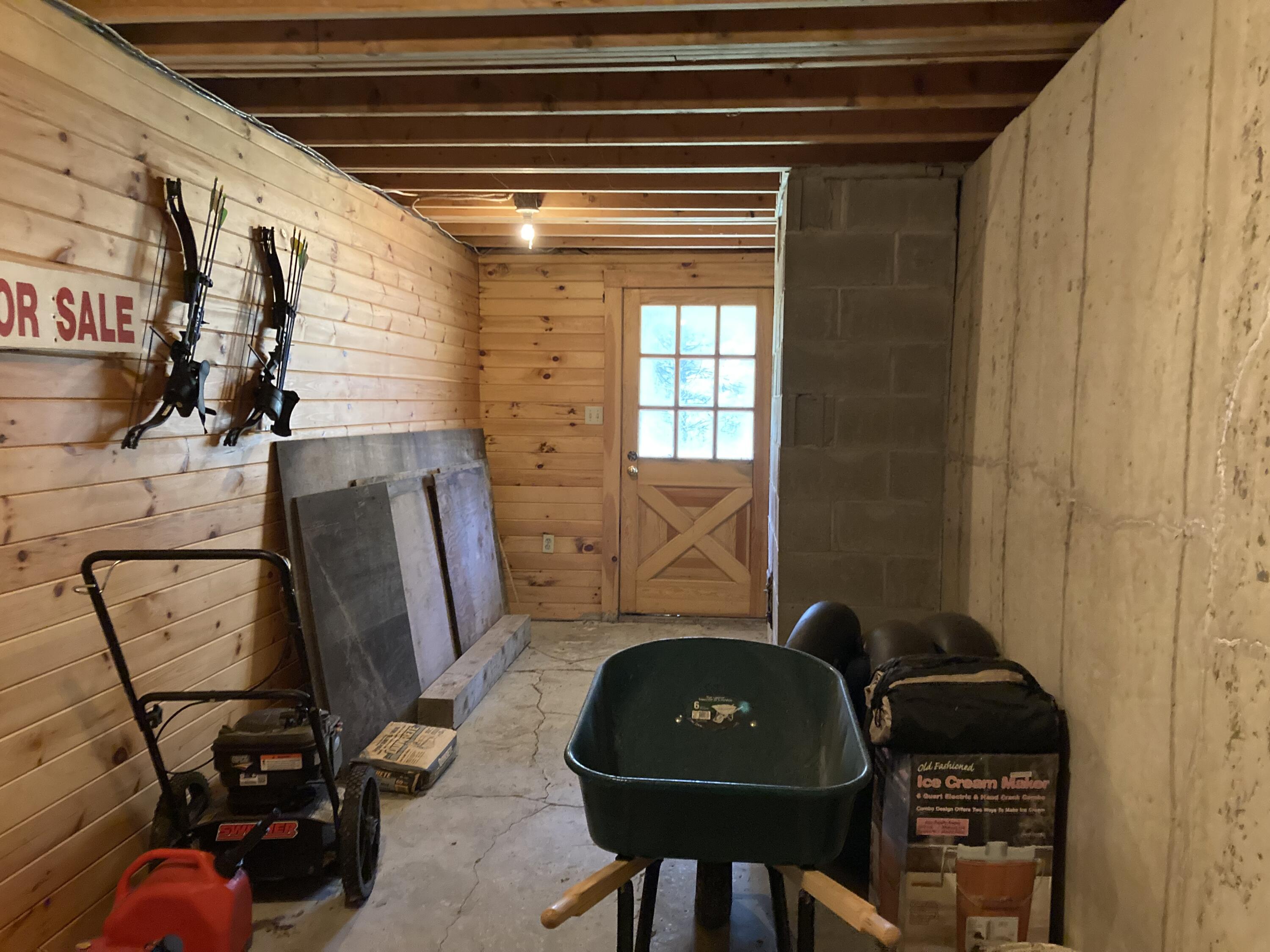 414 River Bend Cherryfield, ME 04622 - Photo 23 of 38 Exterior exit from the lower level.