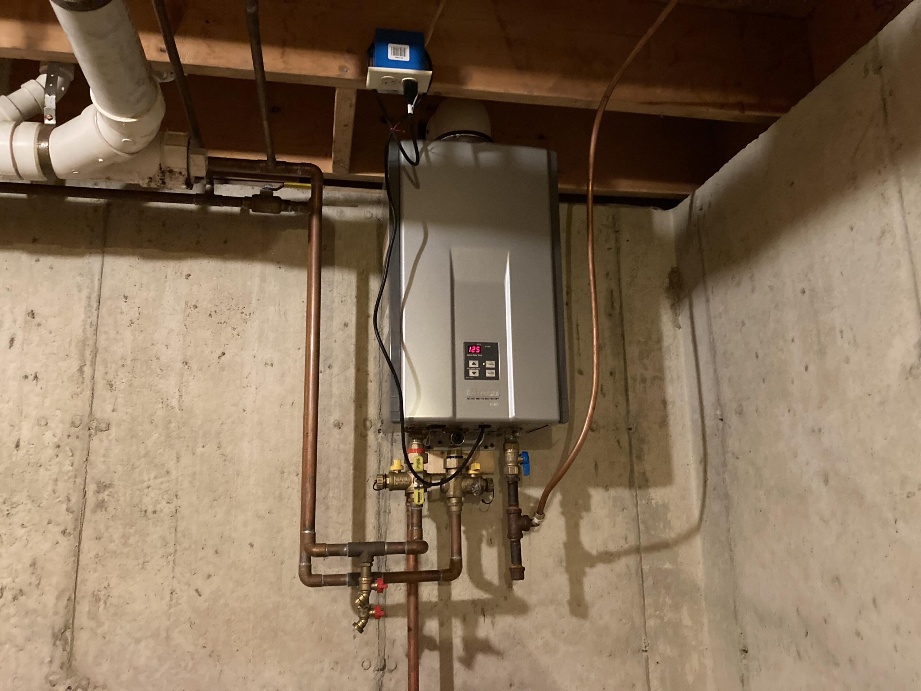 414 River Bend Cherryfield, ME 04622 - Photo 25 of 38 On demand propane hot water heater.