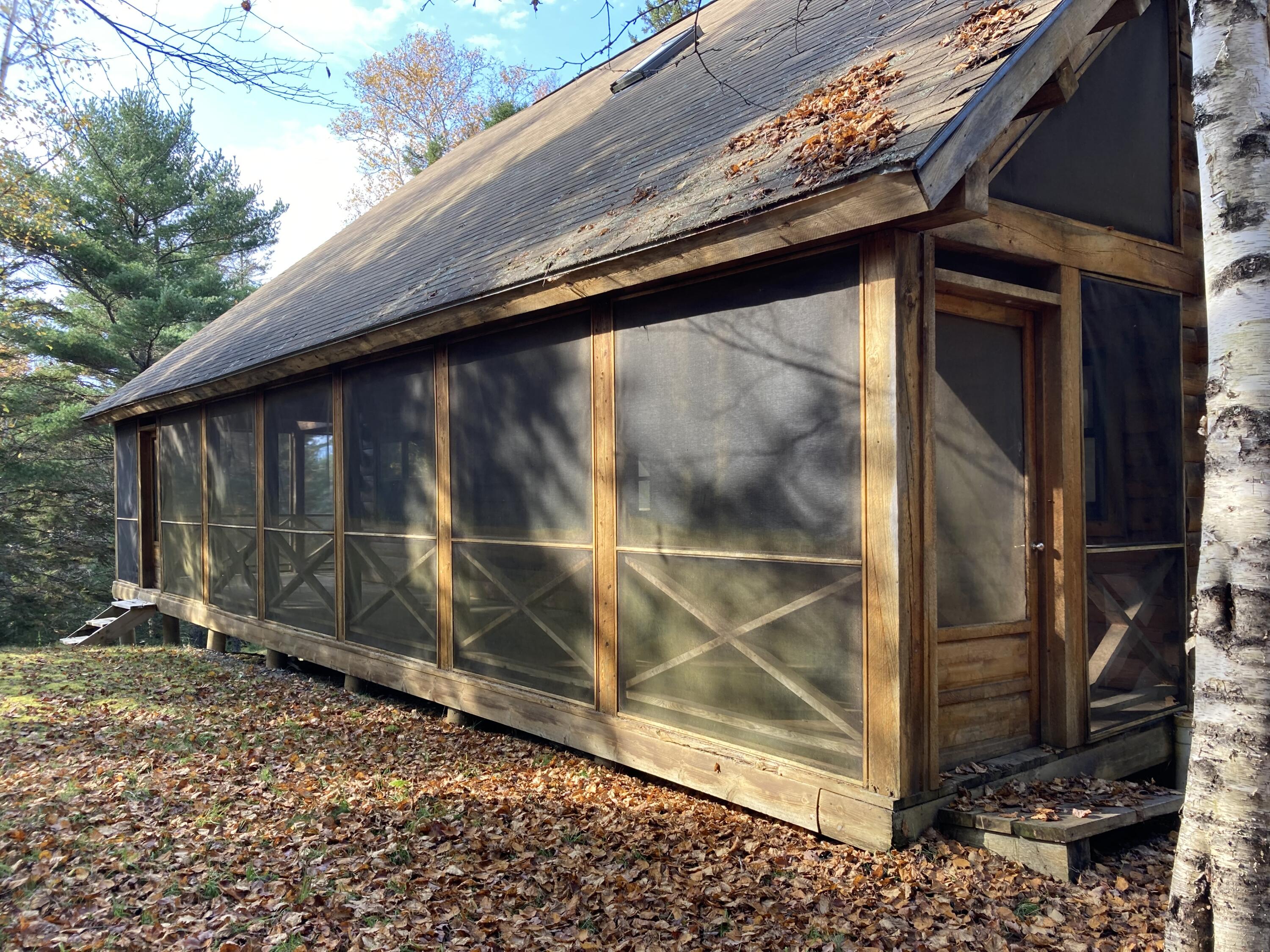 414 River Bend Cherryfield, ME 04622 - Photo 33 of 38 Wrap-around screened porch, east side.