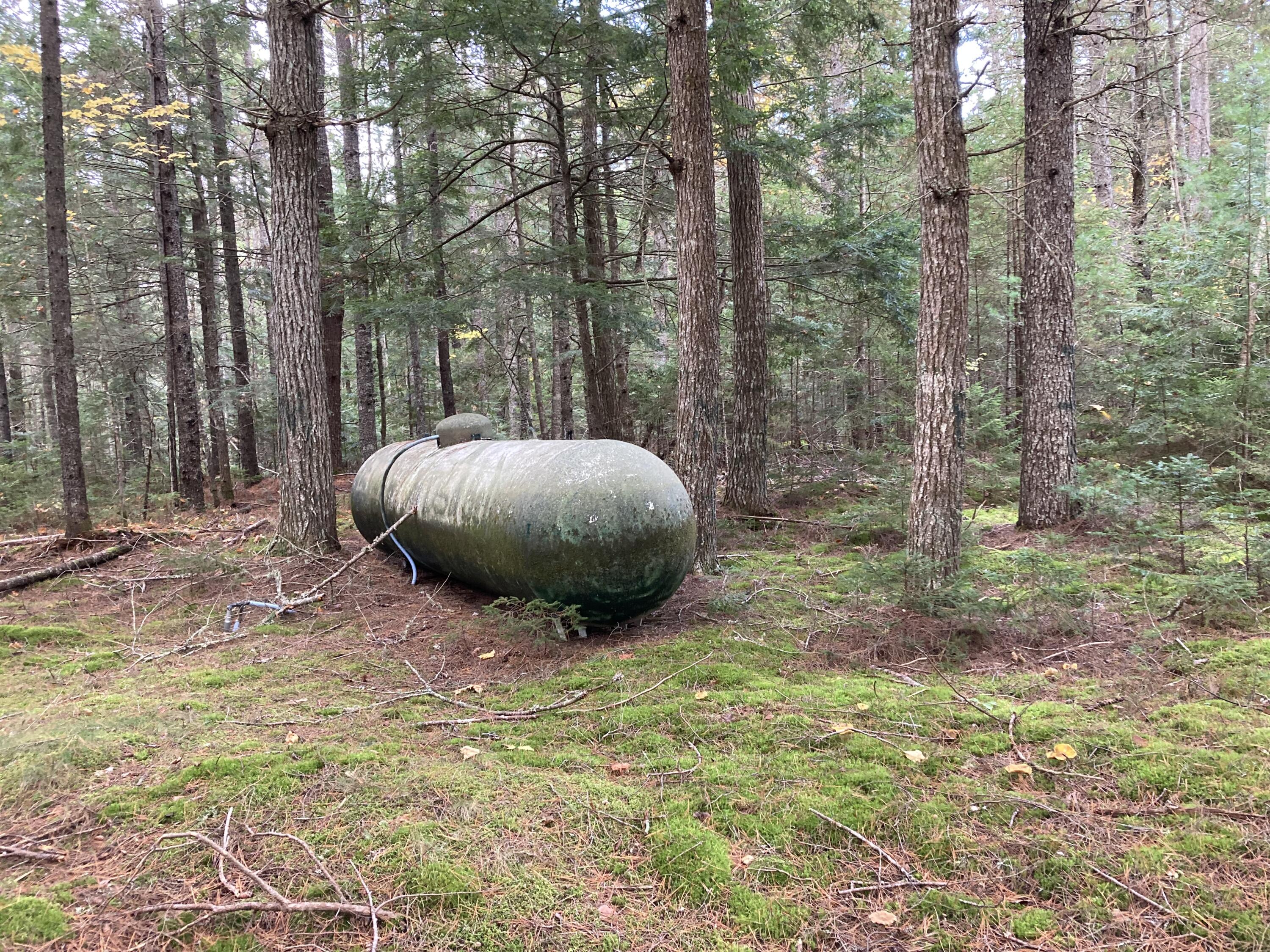 414 River Bend Cherryfield, ME 04622 - Photo 38 of 38 Propane supply next to generator house.