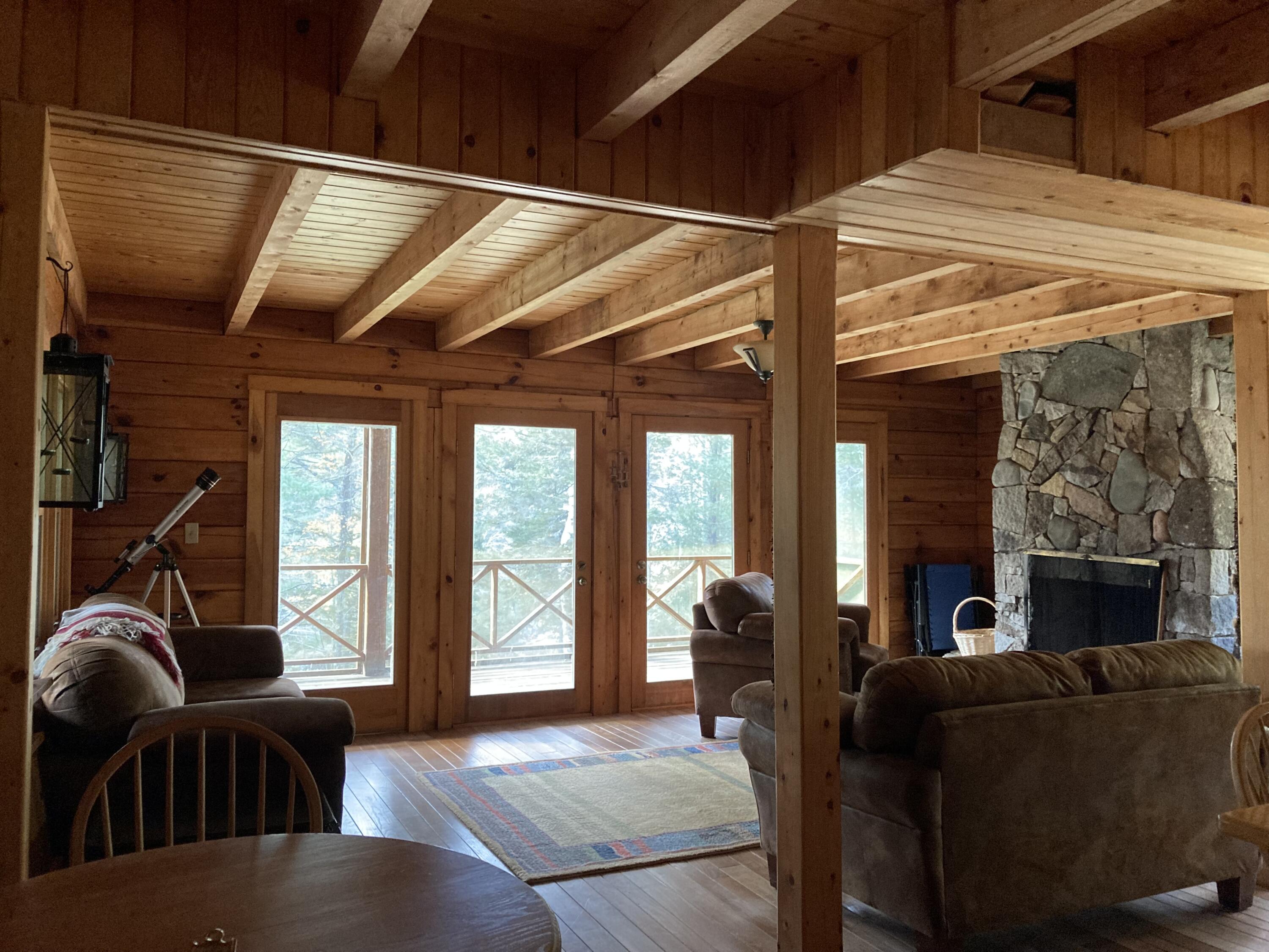 414 River Bend Cherryfield, ME 04622 - Photo 9 of 38 From front door looking into LR.