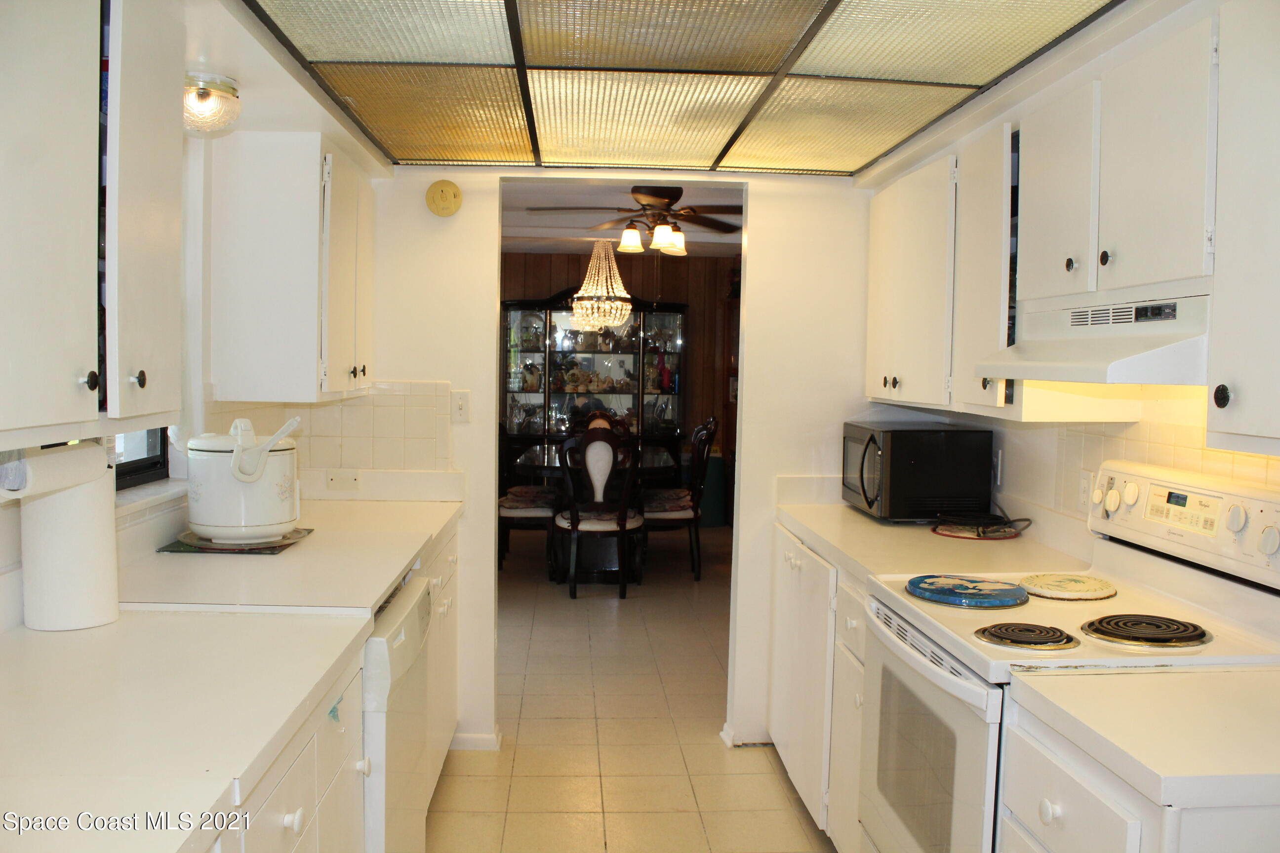 1775 Via Roma Merritt Island, FL 32952 - Photo 8 of 41 Kitchen to Dining
