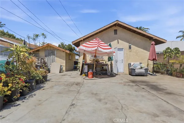 a view of a chairs and tables in the patio