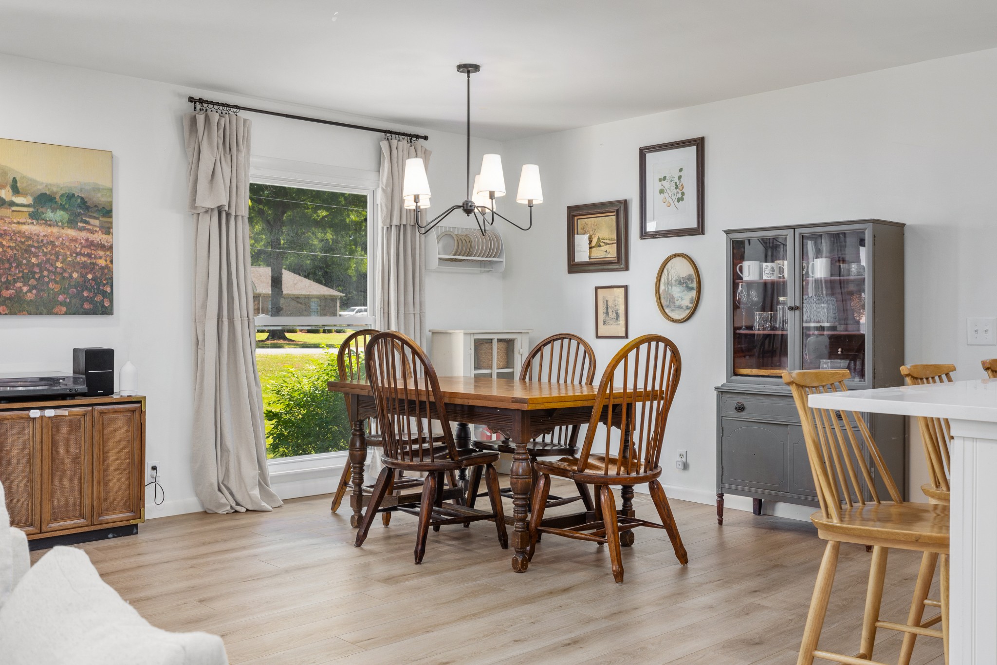 817 Fredricksburg Road Mount Juliet, TN 37122 - Photo 15 of 56 a dining room with furniture a window and wooden floor