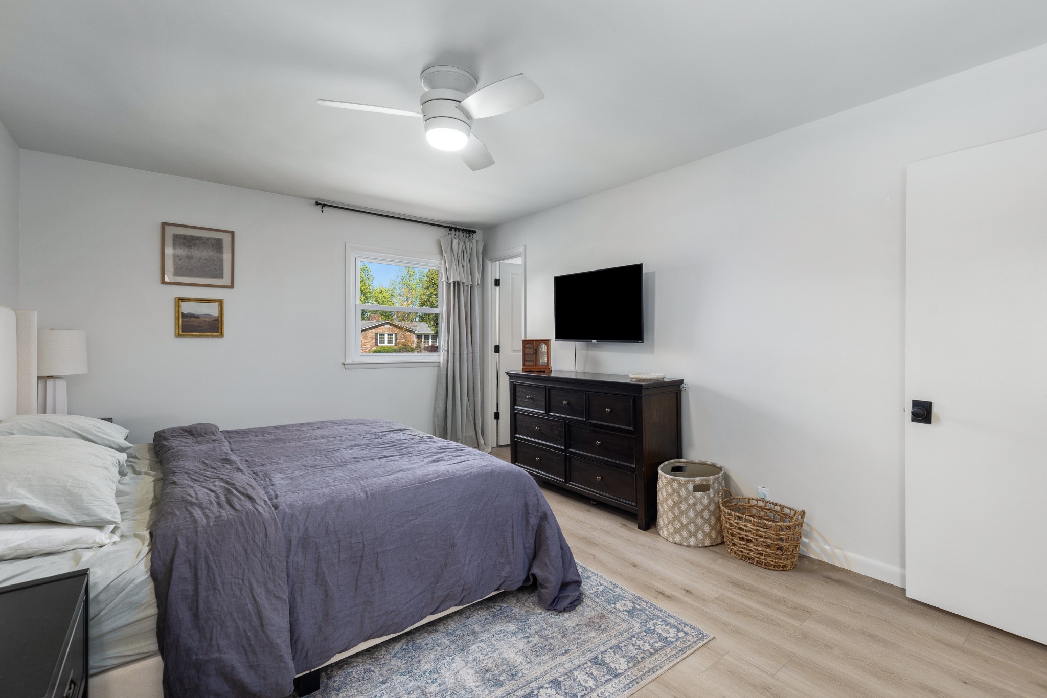 817 Fredricksburg Road Mount Juliet, TN 37122 - Photo 31 of 56 a bedroom with a bed and a flat screen tv