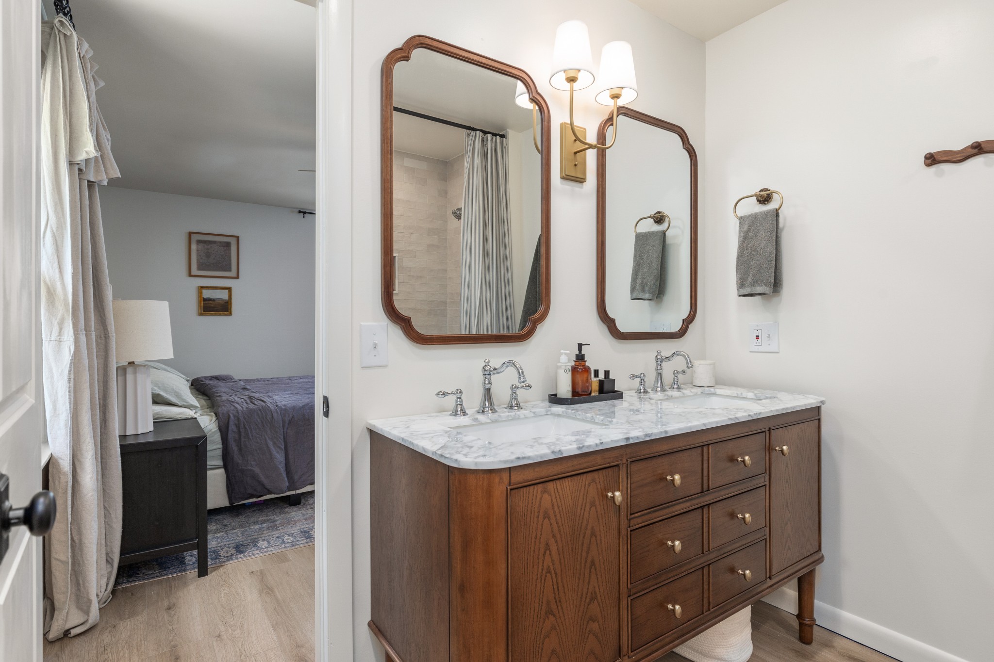 817 Fredricksburg Road Mount Juliet, TN 37122 - Photo 34 of 56 a en suite bathroom with a double vanity sink and a mirror