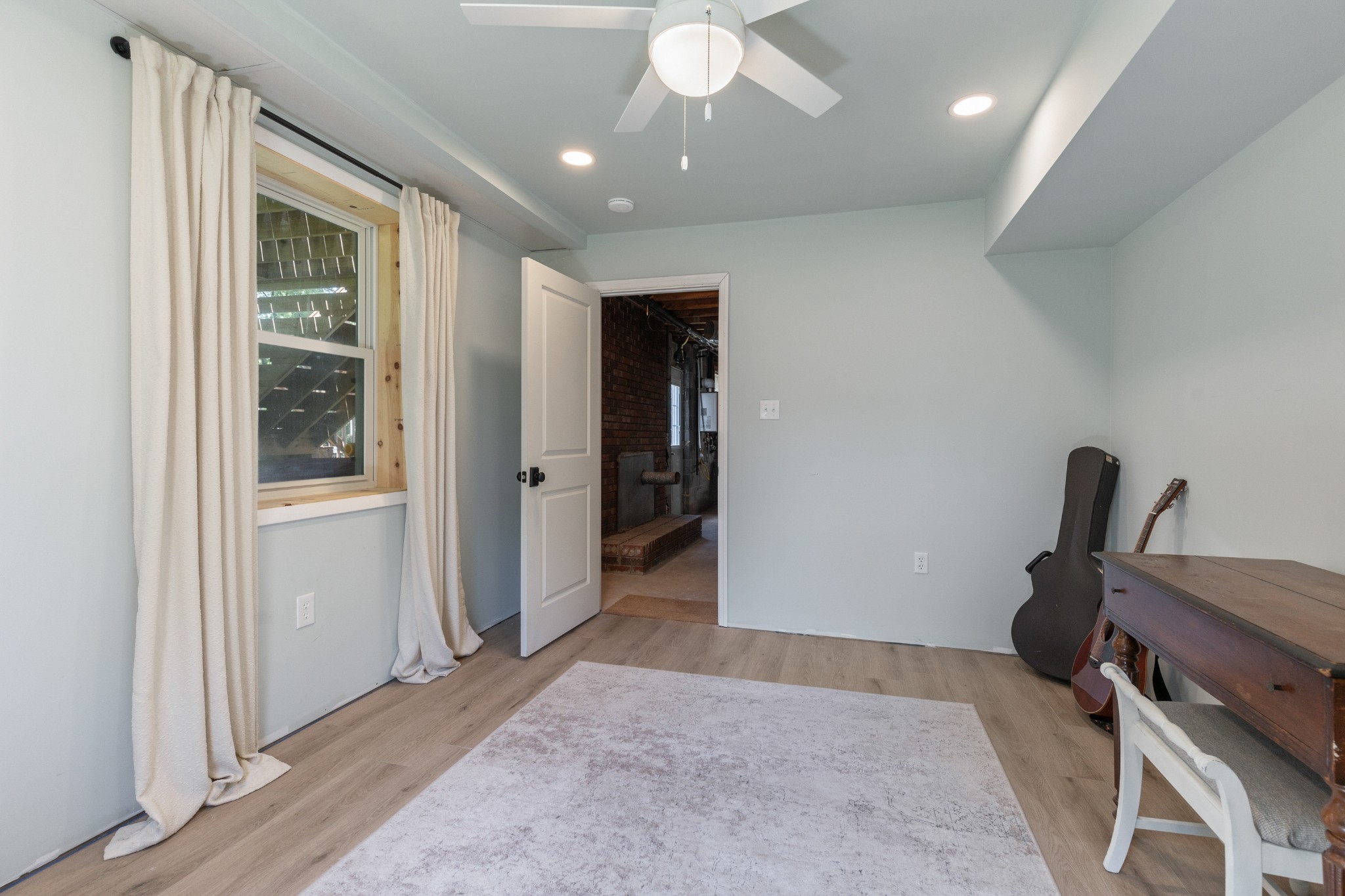817 Fredricksburg Road Mount Juliet, TN 37122 - Photo 41 of 56 a view of a hallway with workspace and a window
