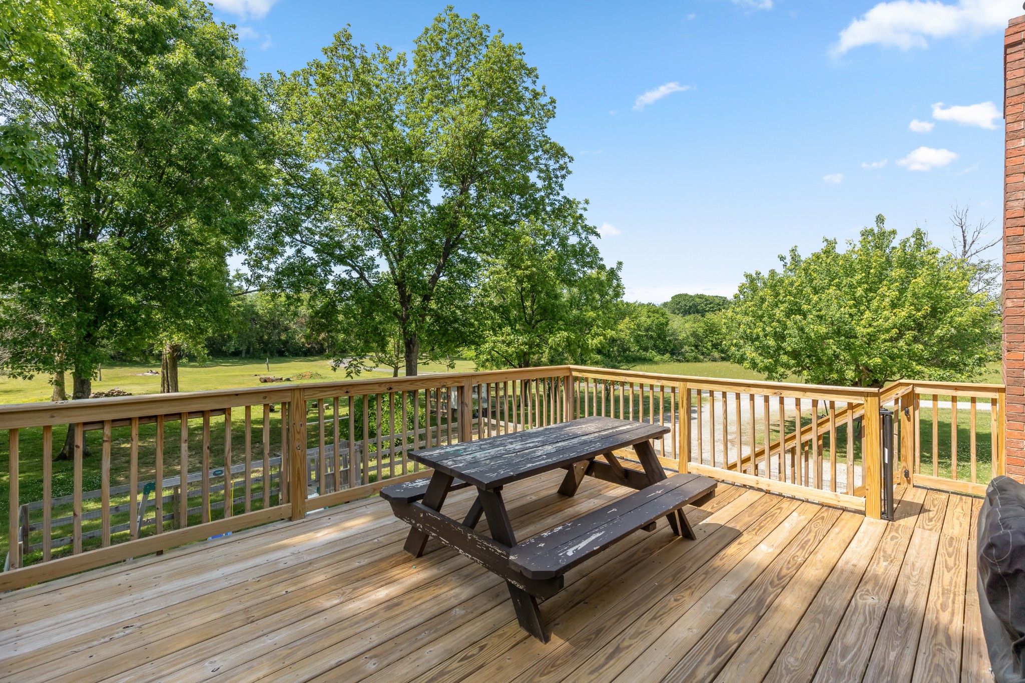 817 Fredricksburg Road Mount Juliet, TN 37122 - Photo 42 of 56 a view of a wooden deck with a bench