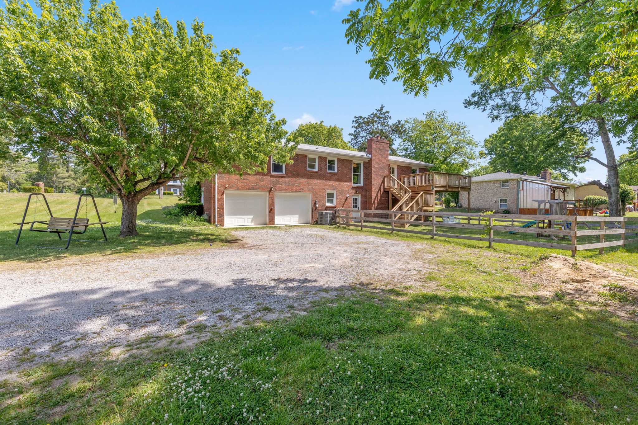 817 Fredricksburg Road Mount Juliet, TN 37122 - Photo 47 of 56 a house view with swimming pool and trees in the background