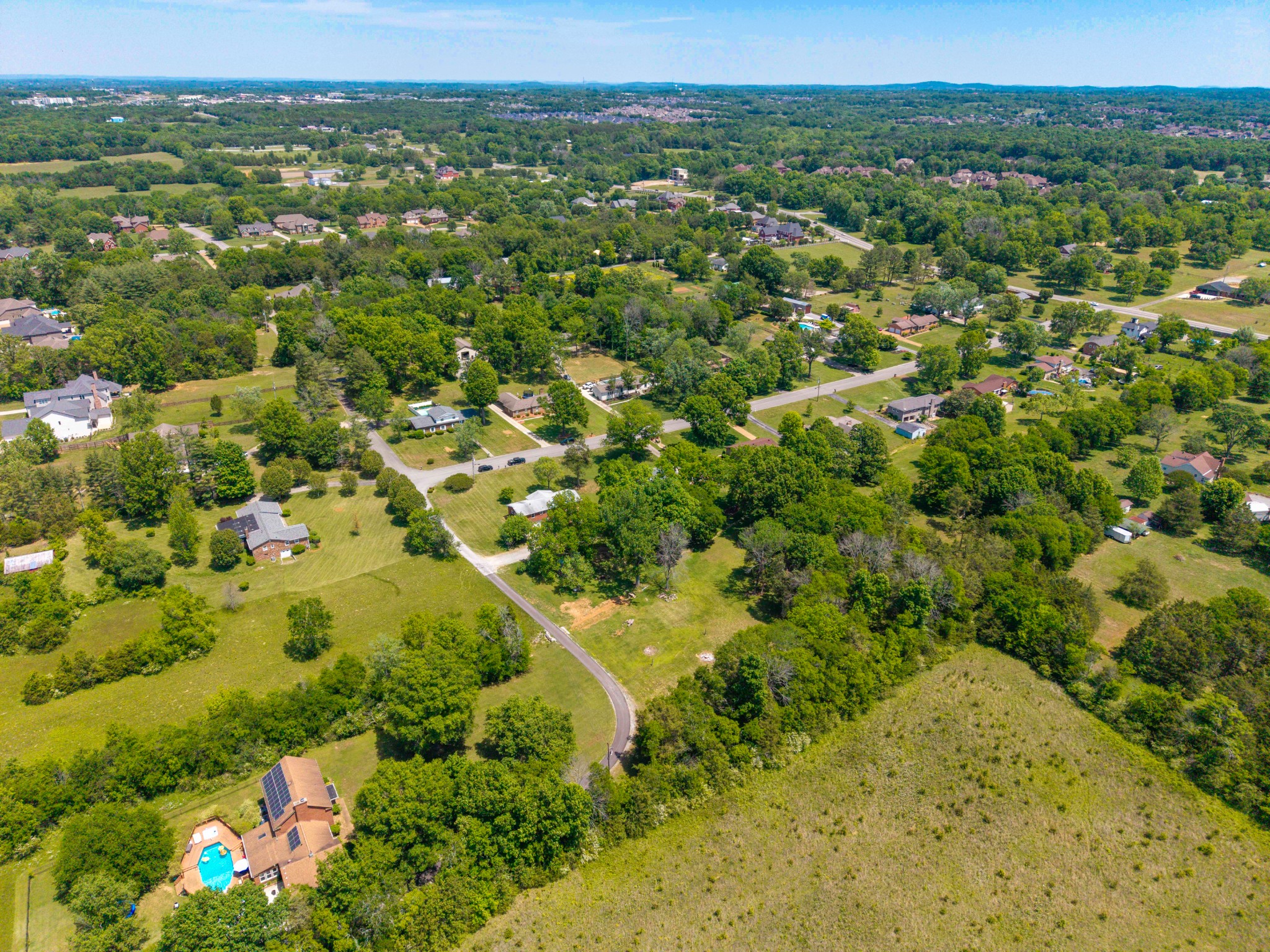 817 Fredricksburg Road Mount Juliet, TN 37122 - Photo 50 of 56 a view of a green field with lots of bushes